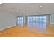 Spacious living area with wood floors, recessed lighting and glass windows at 4823 Arlington Rd, Palmetto, FL 34221