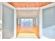 Bright living room offering water views through sliding glass doors, and hardwood flooring at 4823 Arlington Rd, Palmetto, FL 34221