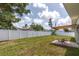 Well-maintained backyard with privacy fence, lawn, and sitting area at 5685 35Th N Ave, St Petersburg, FL 33710