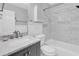 Updated bathroom featuring a shower and tub combination with modern tiling at 5685 35Th N Ave, St Petersburg, FL 33710