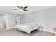 Cozy bedroom featuring light wood floors, and a ceiling fan, complemented by modern furnishings at 5685 35Th N Ave, St Petersburg, FL 33710