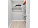 Well-organized walk-in closet offering ample storage space with shelving and natural light at 5685 35Th N Ave, St Petersburg, FL 33710