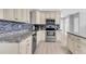Bright kitchen boasting stainless steel appliances, modern cabinetry, and stylish backsplash at 5685 35Th N Ave, St Petersburg, FL 33710
