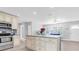 Spacious kitchen with a large island, stainless steel appliances, and an open layout at 5685 35Th N Ave, St Petersburg, FL 33710