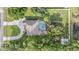 Aerial view of property showing roof, pool, and landscaping at 6411 Barton Rd, Plant City, FL 33565