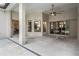 A spacious outdoor patio with ceiling fan and views from inside the home through large windows and sliding glass doors at 6411 Barton Rd, Plant City, FL 33565
