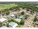 This aerial view features well-kept homes and landscaping along with mature trees and green spaces at 6551 S West Shore Cir, Tampa, FL 33616