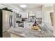 Beautiful updated kitchen with stainless steel appliances and granite countertops at 6551 S West Shore Cir, Tampa, FL 33616