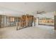 Open concept living room featuring tiled floor and ceiling fan at 709 Pruitt Dr, Madeira Beach, FL 33708