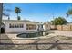 Backyard view of the pool featuring a brick deck, and fenced yard with palm trees at 709 Pruitt Dr, Madeira Beach, FL 33708