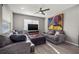 Comfortable living room filled with natural light, stylish furniture and a ceiling fan at 7307 34Th N Ave, St Petersburg, FL 33710