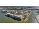Gorgeous aerial view of waterfront condos, and picturesque surroundings in a vibrant neighborhood at 7600 Sun Island S Dr # 407, South Pasadena, FL 33707