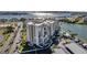 Beautiful waterfront condo with lush landscaping, covered parking, and scenic views of the surrounding area at 7600 Sun Island S Dr # 407, South Pasadena, FL 33707