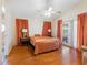 Bright bedroom with hardwood floors, vaulted ceiling and direct access to the outside at 7712 40Th N Ter, St Petersburg, FL 33709