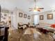 Inviting living room with comfortable seating, marble flooring, and stylish decor throughout the space at 7712 40Th N Ter, St Petersburg, FL 33709