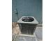 Outdoor air conditioning unit against the exterior of a home at 7831 Red Run Dr, Port Richey, FL 34668