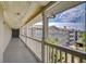 Balcony view overlooking exterior grounds and neighboring buildings at 800 S Dakota Ave # 429, Tampa, FL 33606