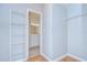 Walk-in closet with shelving and access to the bathroom at 800 S Dakota Ave # 429, Tampa, FL 33606