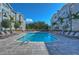 Sparkling community pool with ample lounge seating, creating a resort-style atmosphere for residents to enjoy at 800 S Dakota Ave # 429, Tampa, FL 33606