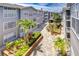 Exterior view of the lush, landscaped courtyard of the community at 800 S Dakota Ave # 429, Tampa, FL 33606