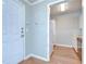 View of the entry into a home and the doorway to the kitchen area at 800 S Dakota Ave # 429, Tampa, FL 33606