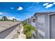 An exterior view of the building with palm trees and blue skies at 800 S Dakota Ave # 429, Tampa, FL 33606