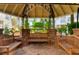 Relaxing gazebo seating area within a landscaped courtyard, offering a tranquil spot to unwind in Hyde Park Walk at 800 S Dakota Ave # 429, Tampa, FL 33606