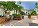 Community grilling area with seating, perfect for outdoor gatherings and enjoying the Florida weather at 800 S Dakota Ave # 429, Tampa, FL 33606