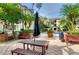 Outdoor grilling area with seating, offering a perfect spot for community gatherings and enjoying the weather at 800 S Dakota Ave # 429, Tampa, FL 33606