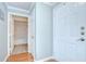 Hallway view of the entry, showing access to the bathroom and other rooms at 800 S Dakota Ave # 429, Tampa, FL 33606