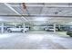 Parking garage with clearly marked parking spaces and ample lighting for ease of parking and security at 800 S Dakota Ave # 429, Tampa, FL 33606