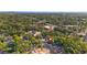 Aerial view showing location amidst a neighborhood with mature trees at 8112 N 10Th St, Tampa, FL 33604