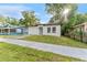 Charming single-story home boasts a freshly painted exterior, a new roof, and a well-maintained yard at 8112 N 10Th St, Tampa, FL 33604