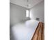 Cozy bedroom featuring a ceiling fan, a window, and light colored tile flooring at 8209 Volusia Pl, Tampa, FL 33637