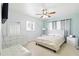 Inviting bedroom with bright decor, a plush bed, and ample natural light at 8525 N Ola Ave, Tampa, FL 33604