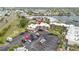 An aerial view of condos, a parking lot, and the community's waterways at 1028 Apollo Beach Blvd # 203, Apollo Beach, FL 33572