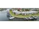 An aerial view of the waterfront condos with boat docks and green space at 1028 Apollo Beach Blvd # 203, Apollo Beach, FL 33572