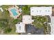 Aerial view of building surrounded by greenery and parking lot at 1028 Apollo Beach Blvd # 203, Apollo Beach, FL 33572