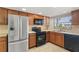 Efficient kitchen features stainless appliances, window and laminate counters at 1028 Apollo Beach Blvd # 203, Apollo Beach, FL 33572