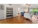 Comfortable living room with ceiling fan and access to balcony at 1028 Apollo Beach Blvd # 203, Apollo Beach, FL 33572