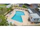 Amazing in-ground pool with lots of lounge chairs at 1028 Apollo Beach Blvd # 203, Apollo Beach, FL 33572