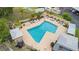 Stunning in-ground pool with lounge seating at 1028 Apollo Beach Blvd # 203, Apollo Beach, FL 33572