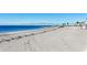 Expansive beach view with calm waters and a clear sky, perfect for relaxation at 1102 Goshen Rd, Tarpon Springs, FL 34689