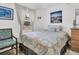 Relaxing bedroom features wood-look floors, a window, and a serene atmosphere at 1102 Goshen Rd, Tarpon Springs, FL 34689