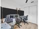 Office setup featuring a flight simulator and workstation at 1102 Goshen Rd, Tarpon Springs, FL 34689