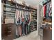 Walk-in closet provides ample storage with shelves, drawers, and hanging space for an organized wardrobe at 11714 Sunburst Marble Rd, Riverview, FL 33579
