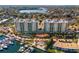 Expansive aerial view of luxury condo buildings, marina, and manicured landscaping, capturing the essence of waterfront living at 1325 Snell Isle Ne Blvd # 708, St Petersburg, FL 33704
