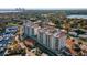 Stunning aerial view of the Water Club condos and marina, surrounded by lush greenery and waterways at 1325 Snell Isle Ne Blvd # 708, St Petersburg, FL 33704
