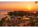 Breathtaking sunset aerial view of the marina showcasing yachts, palm trees, and waterfront living at 1325 Snell Isle Ne Blvd # 708, St Petersburg, FL 33704