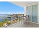 Inviting balcony showcasing stunning waterfront views and a cozy seating arrangement, perfect for relaxing at 1325 Snell Isle Ne Blvd # 708, St Petersburg, FL 33704